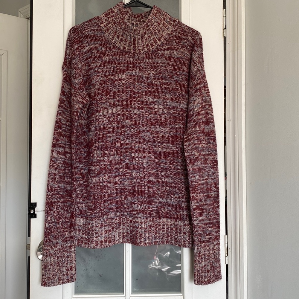 Altar’d State’s Hem & Thread line women’s open back wool blend mock neck sweater